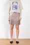 The Embroidered Skirt 492 by Acne Studios has a sequin embroidered detailing at the bottom hem and a side slit