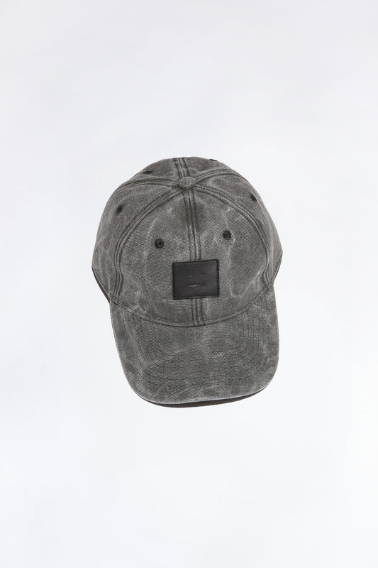 The Baseball Cap 171  by Acne Studios is a carbon grey six-panel baseball cap made from cotton canvas with a washed finish and detailed with a leather face patch logo patch
