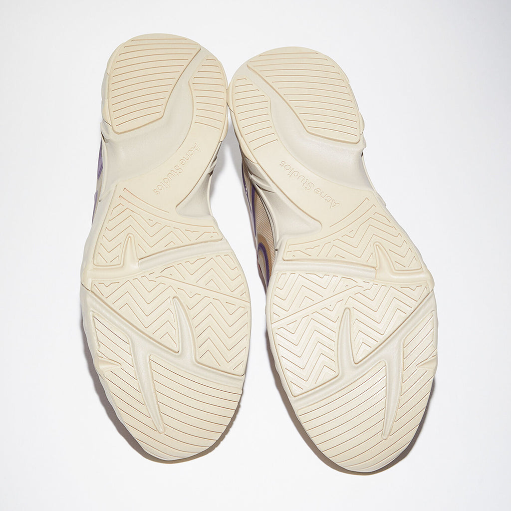 The N3W TOKAI Ribbon Sneakers by Acne Studios are multi beige lace-up sneakers with a ribbon logo pattern and an Acne Studios logo