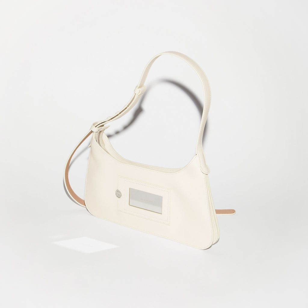 The Platt Mini Bag by  ACNE STUDIOS has a minimalistic silhouette with sculptural folds at the base and sides