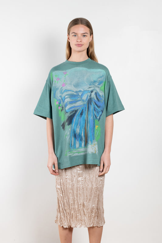The Bow Print Tee 522 by Acne Studios is a relaxed green t-shirt with an artwork print by artist Karen Kilimnik on the front