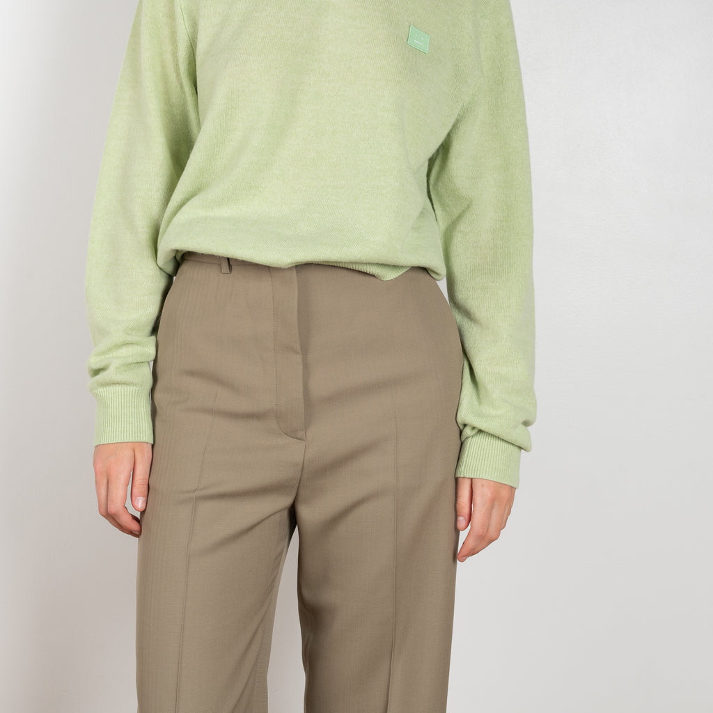 The Tailored Trouser 889 by Acne Studios is a high waisted suiting trouser with a cropped wide leg
