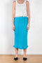 The Tassel Skirt 497 by Acne Studios is a turquoise pencil skirt with a ribbed finish, a tonal tassel at the bottom hem, stitching details and a back centre slit