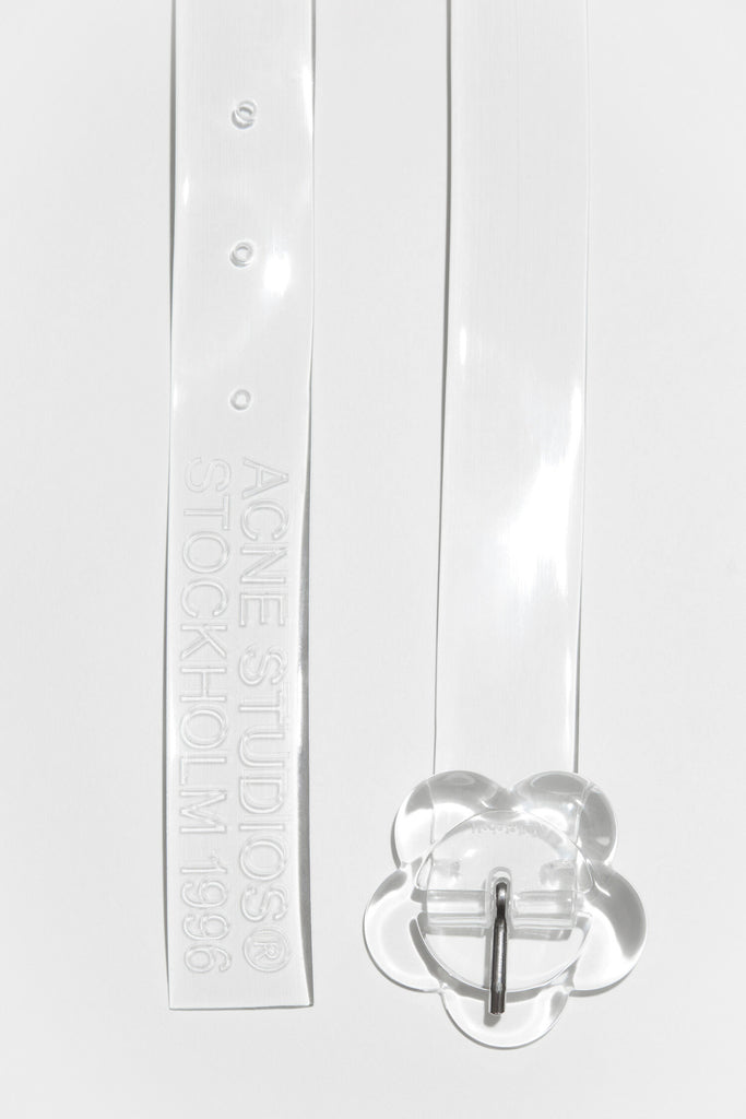 The Flower Belt 115 is a transparent belt detailed with a flower-shaped buckle and Acne Studios engraved logo
