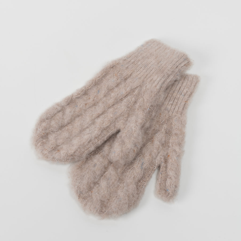 The Cable Knit Mittens 29  by Acne Studios are soft wool cable mittens with a ribbed cuff