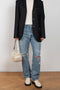 The 90'S Jeans by Agolde in color streamline is a relaxed mid rise straight leg jeans in a distressed mid blue wash