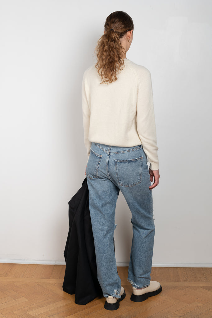 The 90'S Jeans by Agolde in color streamline is a relaxed mid rise straight leg jeans in a distressed mid blue wash