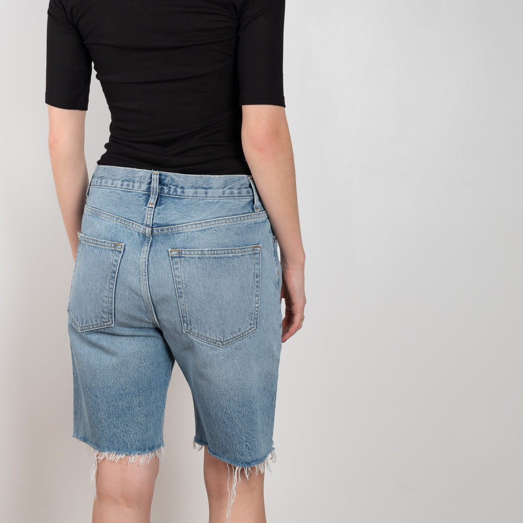 The Ira Short Waist by Agolde in color Misunderstood has a a mid-rise loose fit, longer inseam and 90's connotations in a medium blue wash