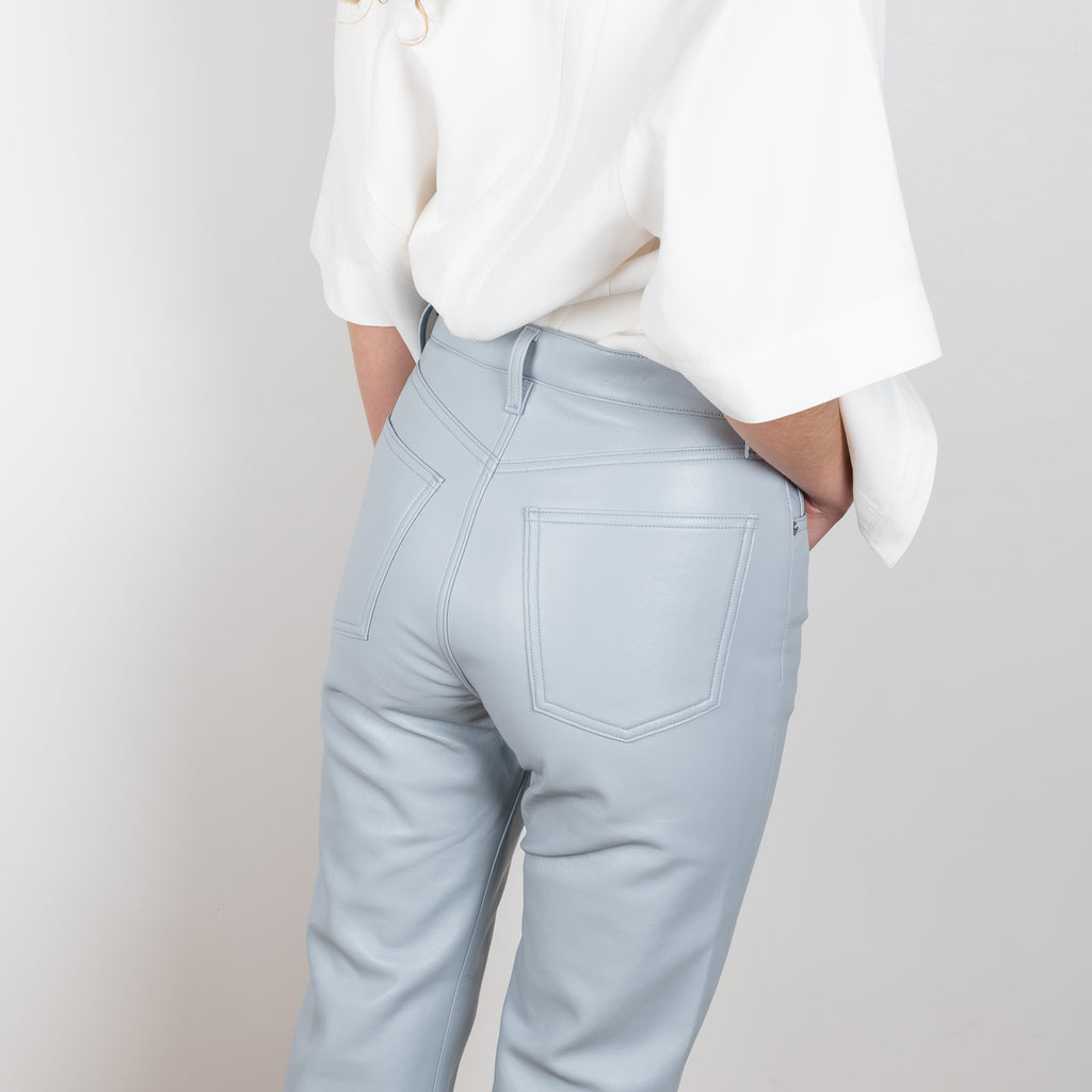 The 90's Pinch Leather by Agolde is a relaxed high waisted straight leg leather pants in a greyish blue