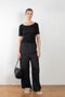 The Domond Pants by Baserange are high waisted loose trousers in black linen