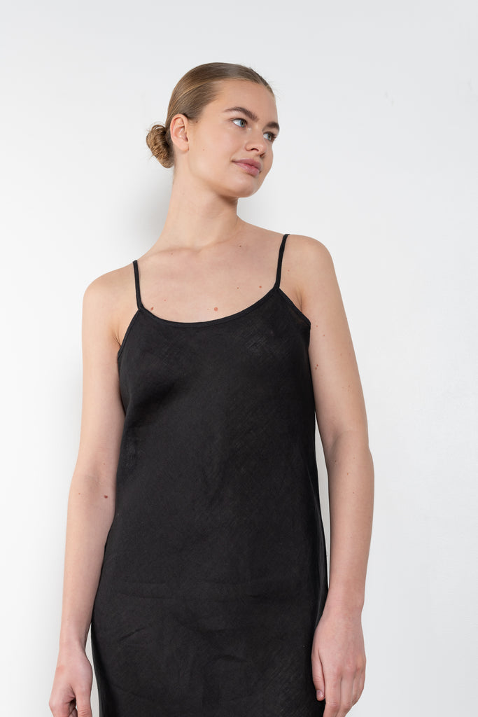 The Dydine Dress by Baserange is a minimalistic summer dress in linen with fine straps