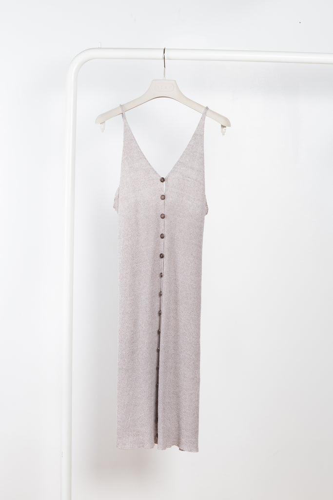 The Oder Dress by Baserange is a delicate linen rib dress with fine straps and button down details