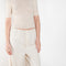 The Stoa Pants by Baserange are high waisted loose trousers in undyed organic cotton