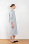 The Ole Shirtdress by Baserange is a striped summer shirtdress in organic cotton that can be worn as a city dress or as a bikini cover up on your holidays