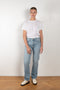 The Brit Jeans by B SIDES  is a mid waisted jeans with a full length straight leg in a mid blue wash