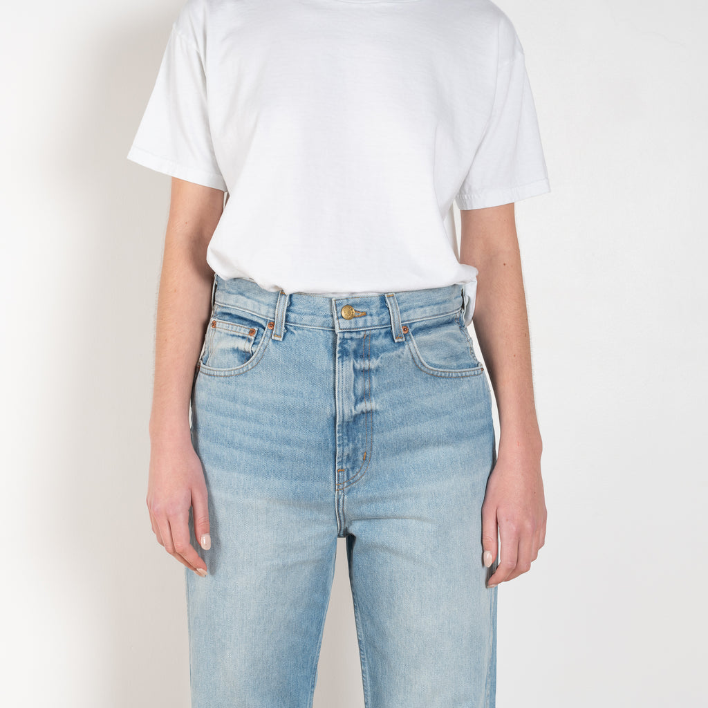 The Plein Relaxed Straight jeans by B SIDES  is a high waisted jeans with a relaxed straight leg in a light blue wash