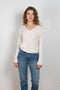 The Louis Hi Slim jeans by  is a high waisted jeans with a fitted straight leg in a vintage medium blue wash