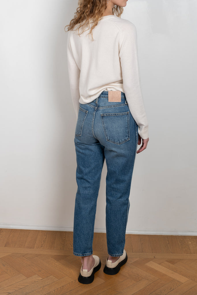 The Louis Hi Slim jeans by  is a high waisted jeans with a fitted straight leg in a vintage medium blue wash