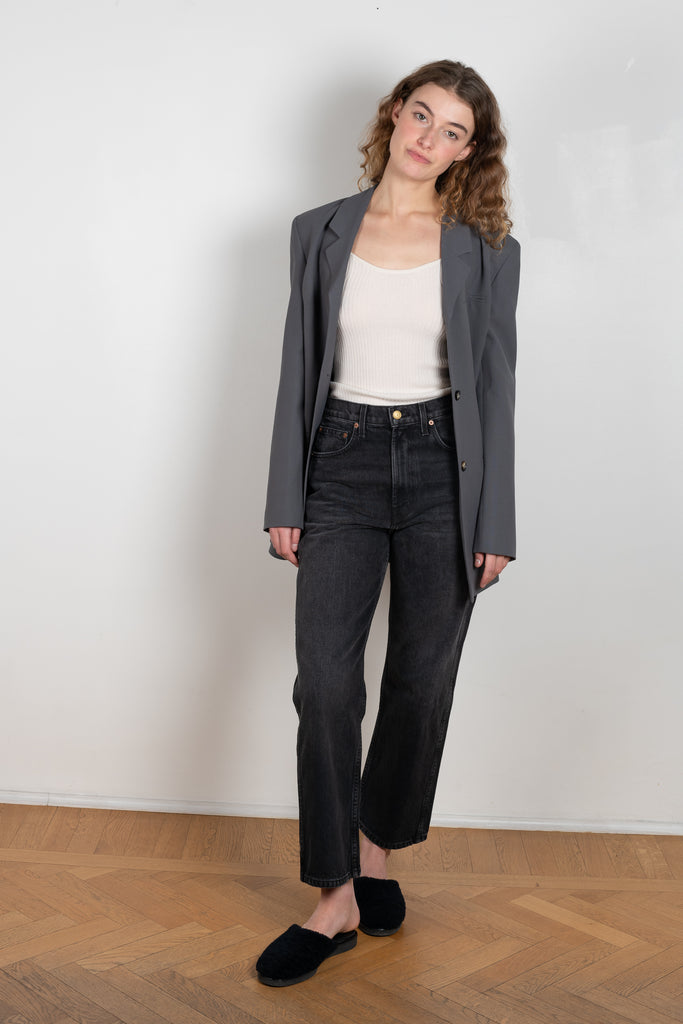 The Plein Relaxed Straight jeans by  is a high waisted jeans with a relaxed straight leg in a faded black wash