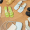 The Shawn Mules by By Far are squared toe flip-flop mules with a sturdy 4 cm block heel