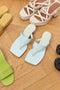 The Shawn Mules by By Far are squared toe flip-flop mules with a sturdy 4 cm block heel