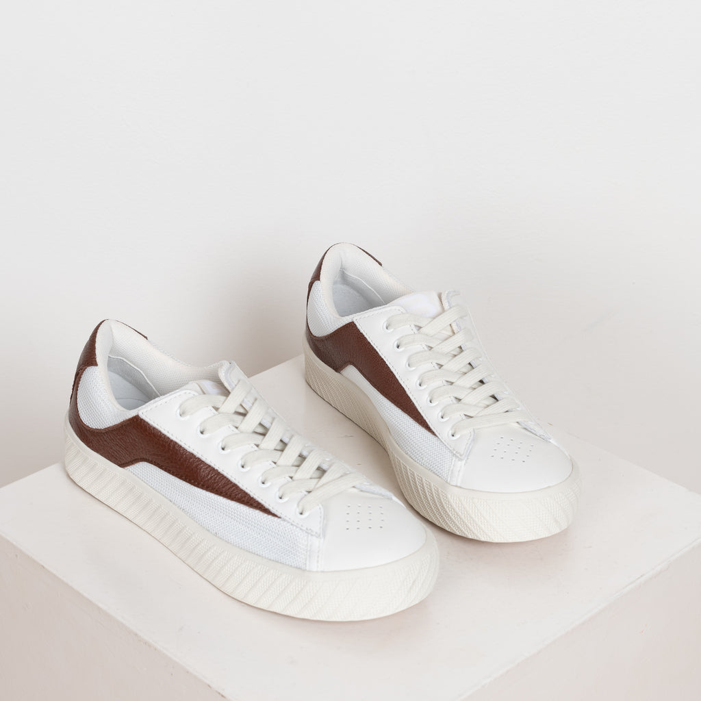 The Rodina Sneakers from By Far are comfy sneakers with a mesh and leather upper and a brown grained leather flash decorative detail