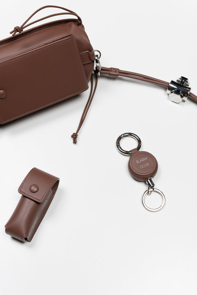 The LL1 Lipstick Holder by ELAOW is a lipstick / lighter case made in soft nappa leather to customize your ELAOW bags