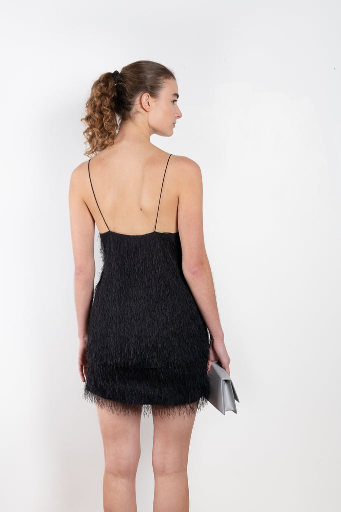 The Fringed Skirt 0523 by GAUCHERE is a black mini skirt with a delicate all-over fringed look