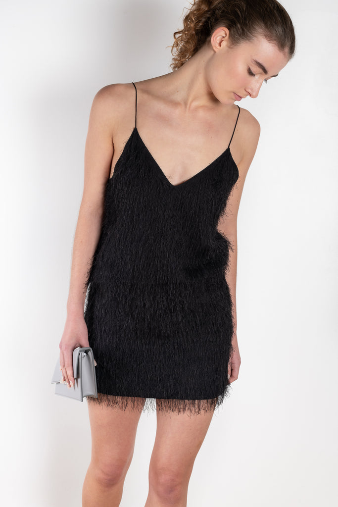  The Fringed Skirt 0523 by GAUCHERE is a black mini skirt with a delicate all-over fringed look