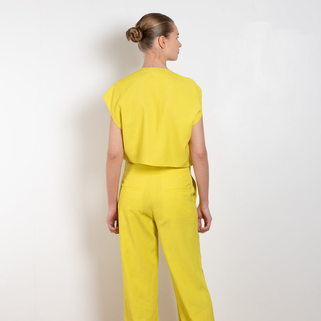 The Trouser 0301 by GAUCHERE is a mid waisted trouser with a wide leg in a vibrant yellow linen blend