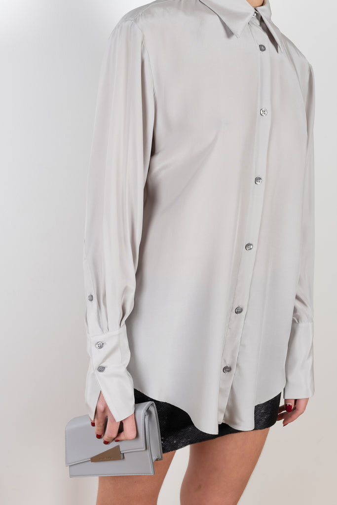 The Okayi Shirt by Gauge81 is a silk over-sized, button-down shirt, an elevated basic oozing with classic appeal