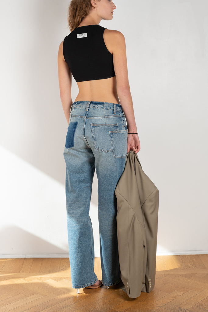 The Cut-out Jeans by Gauchere is a signature denim with a relaxed fit and a cut-out detail at the hips