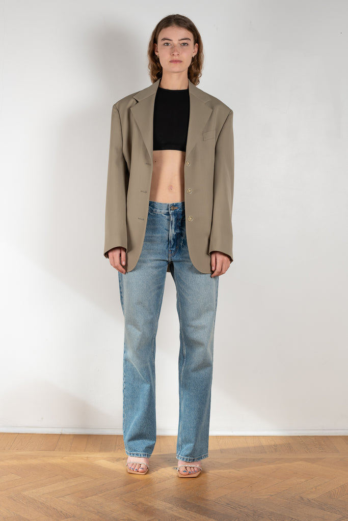 The Cut-out Jeans by Gauchere is a signature denim with a relaxed fit and a cut-out detail at the hips
