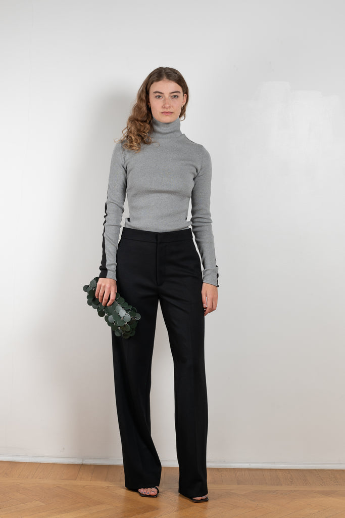 The Two Tone Top by Gauchere is a turtleneck top with a long slim fit in ribbed two tone cotton