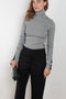 The Two Tone Top by Gauchere is a turtleneck top with a long slim fit in ribbed two tone cotton