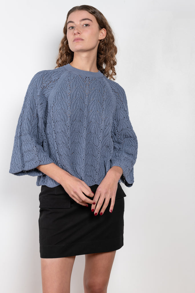 The Cabra Top by LOULOU STUDIO is a cropped Top in a crochet cotton with short bell sleeves