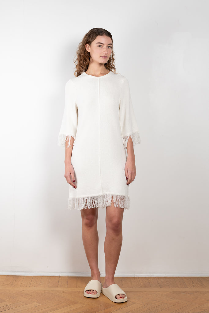 The Cella Dress by Loulou Studio is a fringed dress with albow length sleeves in a soft silk and viscose blend