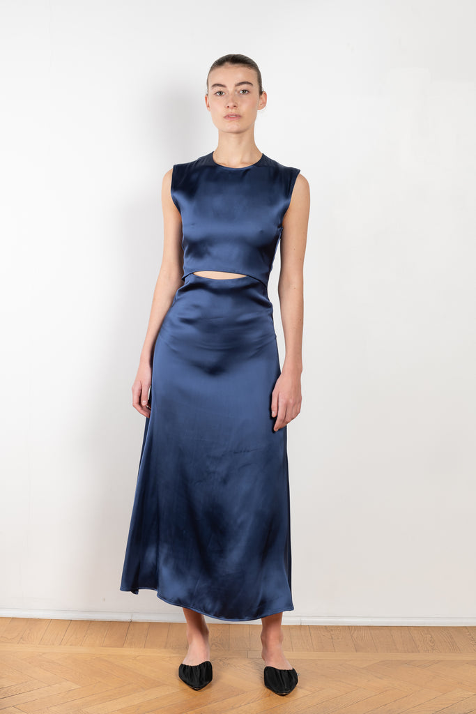 The Copan Cut Out Dress by Loulou Studio is a long dress with  a front cut-out detail in a fluid satin