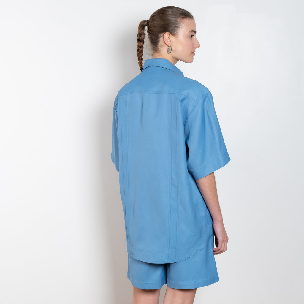 The Moheli Shirt by Loulou Studio is an oversized shirt with rounded hems in a viscose and linen blend twill