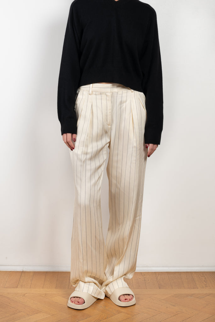 The Nata Pants by Loulou Studio is a wide leg striped trouser in a fluid linen blend with matching shirt