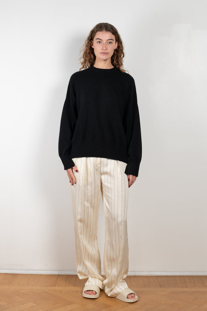 The Nata Pants by Loulou Studio is a wide leg striped trouser in a fluid linen blend with matching shirt