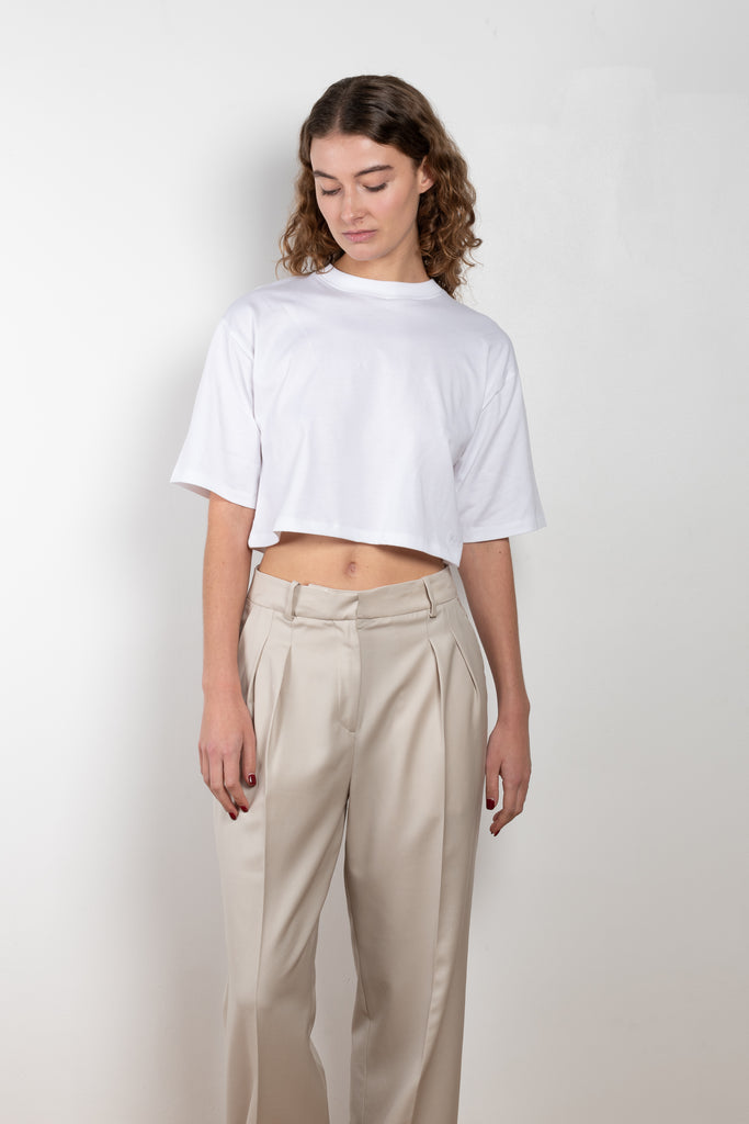 The New Sbiru Pants by Loulou Studio are signature suiting paints that sit on the waist, are ample and pleated at the waist