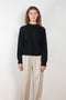 The Pemba Sweater by Loulou Studio is a boxy crew neck pullover with feminine sleeves in a soft cashmere