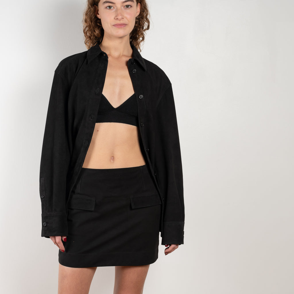 The Veria Suede Skirt by Loulou Studio is a fitted mini skirt in a lightweight and soft suede