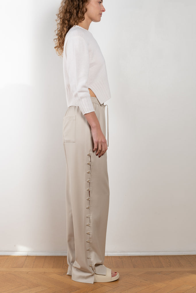 The Checa Pants by Loulou Studio is a relaxed wide leg trouser with side buttons in a lightweight summer wool