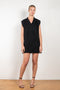The Lola Dress is by Lisa Yang is a mini dress in a structured knitted pattern cashmere with fringed details