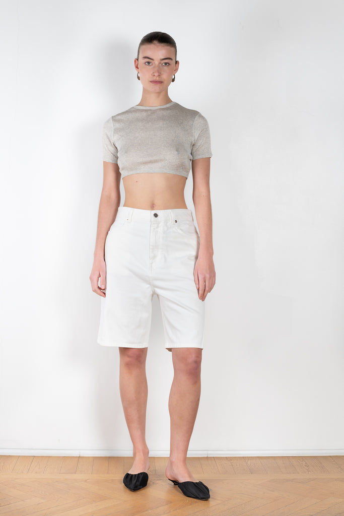 The Isu Shorts by Loulou Studio are high waisted knee length shorts with a relaxed fit, completed with classic denim details