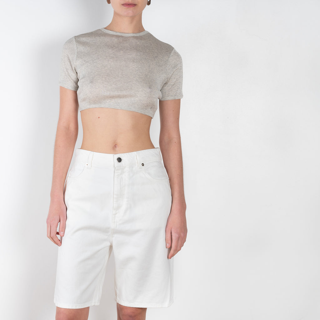 The Isu Shorts by Loulou Studio are high waisted knee length shorts with a relaxed fit, completed with classic denim details