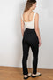 The Pinzon Stirrup Pants by Loulou Studio is a high waisted fitted stirrup trouser with a detachable foot elastic