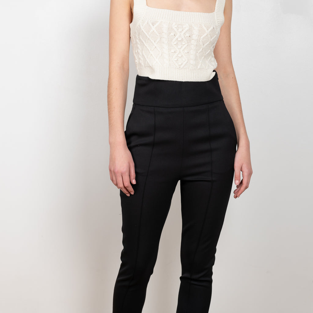 The Pinzon Stirrup Pants by Loulou Studio is a high waisted fitted stirrup trouser with a detachable foot elastic